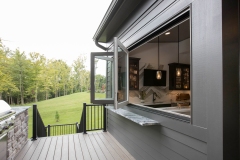 Covered Rear Porch With Pass Thru Window to Bar and Grill Station