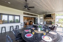 Covered Screened-in Porch with Fireplace and Large Slider Door