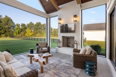 Custom Home Screened-in Covered Porch with Fireplace