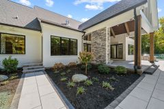 Covered Rear Porch and Primary Bedroom Entrance to Exterior