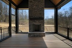 Stone Fireplace in Screened In Porch