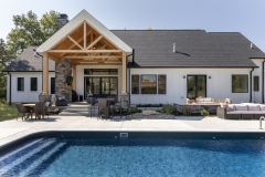 Rear Covered Patio with Fireplace and Pool