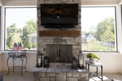 Stone Fireplace in Screened In Porch