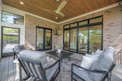 Screened-In Porch with large glass slider at House of Tranquility