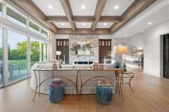 Great Room With Stained Wood Built-ins and Linear Fireplace