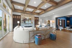 Great Room With Coffered Ceiling and Piano Room
