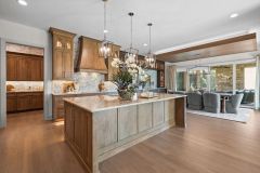 Large Island with Quartzite countertop, Light and Dark Stained Cabinetry