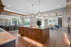 Kitchen, Dining and Great Room Open Floor Plan With Large Windows