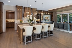 Large Island with Quartzite countertop, Light and Dark Stained Cabinetry
