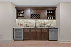 Walk up Bar With Beverage Fridge and Kegerator in Lower Level Media Room