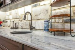 Walk up Bar With Stone Backsplash in Lower Level Media Room
