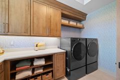 Laundry Room With Open and Closed Storage