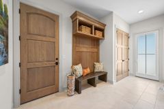 Mudroom with Bench and access to garage and side yard