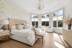 Octagon Shaped Primary Bedroom Large windows with transom