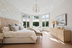 Octagon Shaped Primary Bedroom Large windows with transom