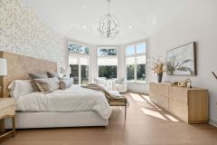 Octagon Shaped Primary Bedroom Large windows with transom