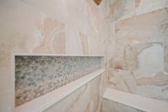 Oversized linear shower niche with accent tile