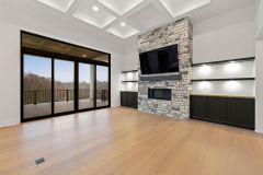 Great-Room-With-Stone-Fireplace-Custom-Built-ins-and-Coffered-Ceiling-3