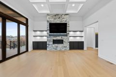 Great-Room-With-Stone-Fireplace-Custom-Built-ins-and-Coffered-Ceiling-4