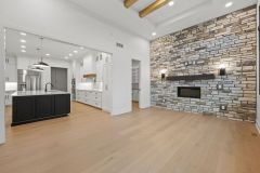Dining-Room-with-Stone-Fireplace-and-Cedar-Beams-2