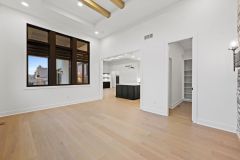 Dining-Room-with-Stone-Fireplace-and-Cedar-Beams-3