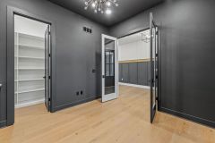 Moody-dark-color-drenched-home-office-with-built-in-cabinetry-4