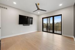 Primary-Bedroom-with-Black-Accent-Wall-and-Walk-out-4