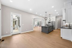 Arched entry to kitchen and walk out to patio