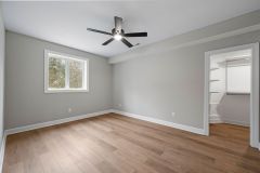 Lower Level Bedroom With Window and Custom Walk-in Closet