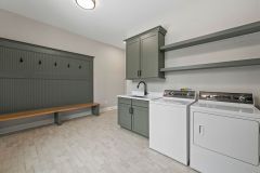 Custom cabinetry and built-in bench in Mudroom at Goshen Estate