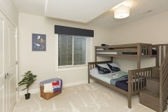 Guest Bedroom Lower Level at Heartland Reserve