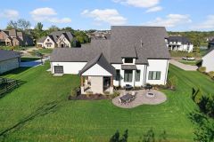 Heartland Haven Back Exterior With Patio and Firepit