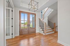 Entry-With-Tray-Ceiling-and-Archway