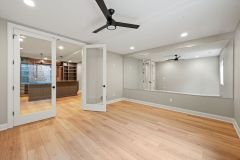 Lower LEvel Exercise Room With Mirror Wall