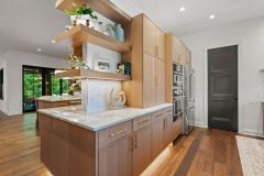 Back Kitchen With Appliances, Pantry and Open Shelving With Integrated Lighting