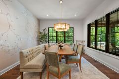 Kitchen Dining Area With Black Frame Windows and Blossom Wallpaper