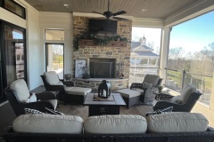 Screened-In Porch  with Sliding Wall Doors and Fireplace