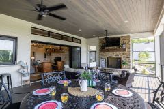 Screened-In Porch  with Sliding Wall Doors and Fireplace
