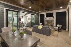 Covered Porch with Fireplace at The Ashby