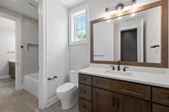 Vanity with famed mirror in the Jack ana Jack bathroom - The Vandoren