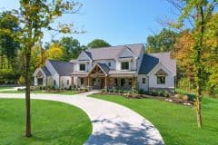 Front view of custom home in Liberty Twp with gables, metal and cedar  accents - The Vandoren