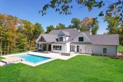 Custom home with rear covered porch and pool-The Vandoren