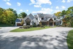 Front View of Custom Home with gables, metal and cedar  accents - The Vandoren