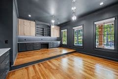His Office With Step Up to Desk and Custom Cabinetry
