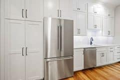 Walk-In Kitchen Pantry with refrigerator, dishwasher and sink - The Vandoren