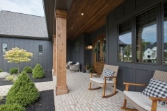 cincinnati custom home covered front porch dark exterior with cedar pillars
