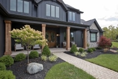 cincinnati custom home covered front porch dark exterior with cedar pillars