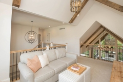 loft or bonus room with cathedral ceiling