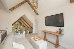 loft or bonus room with cathedral ceiling