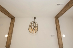 loft or bonus room with cathedral ceiling